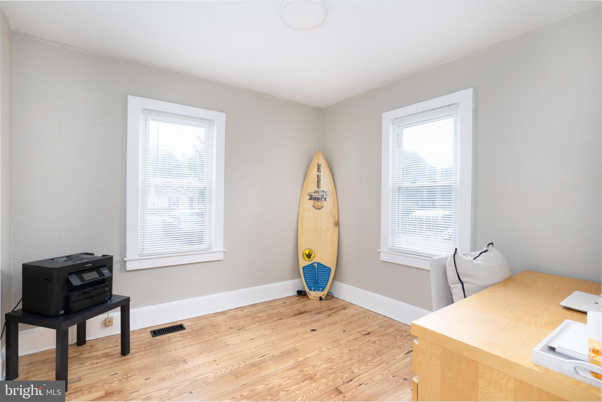 529 North 6th Street Denton, MD 21629 - Photo 13 of 21 a bedroom with a bed and a window