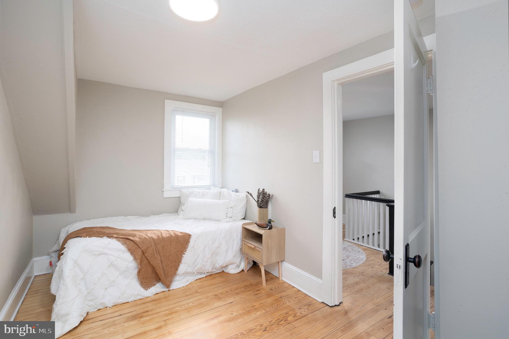529 North 6th Street Denton, MD 21629 - Photo 16 of 21 a bedroom with a bed and a window