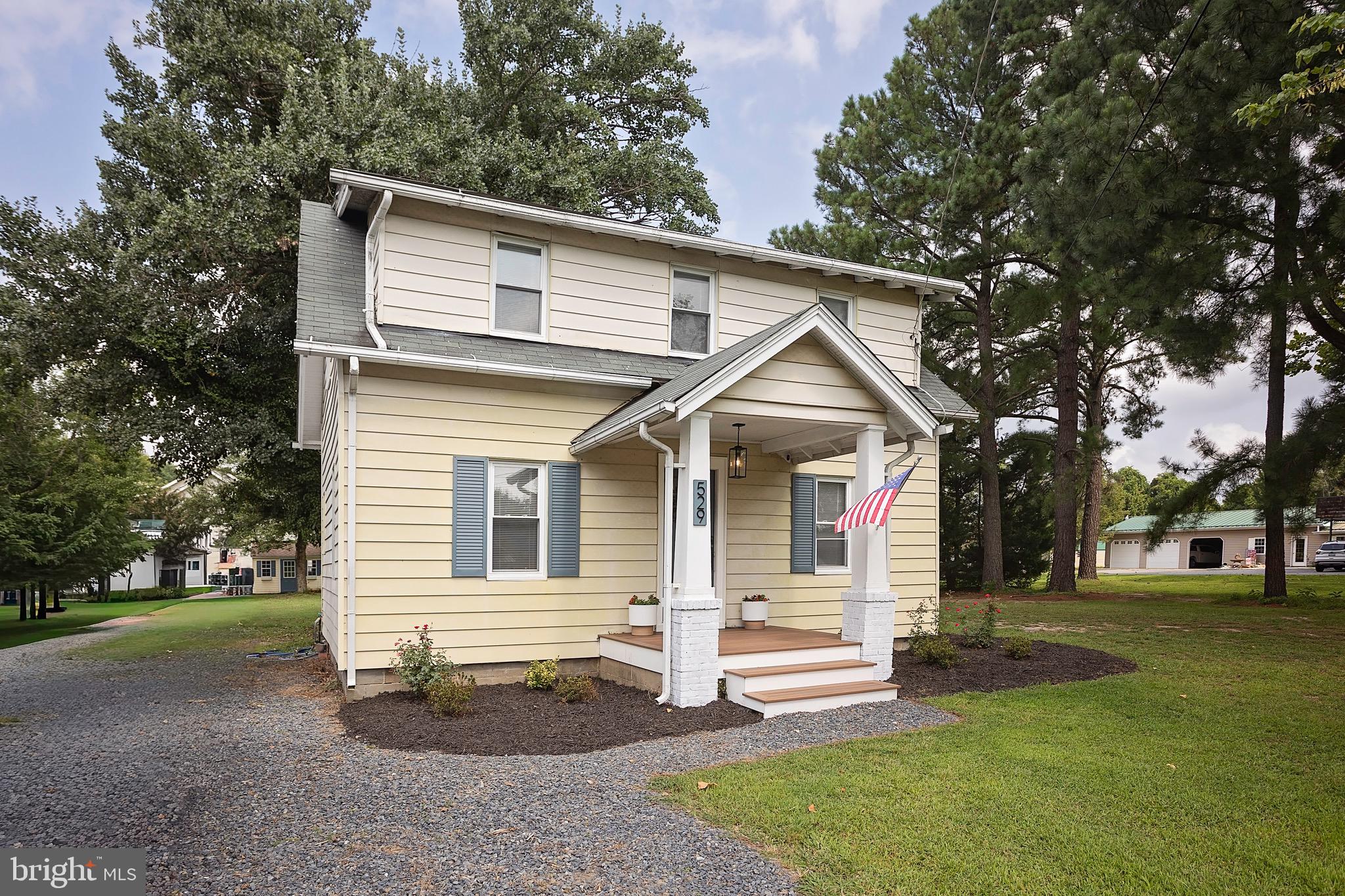 529 North 6th Street Denton, MD 21629 - Photo 2 of 21 a front view of a house with a yard