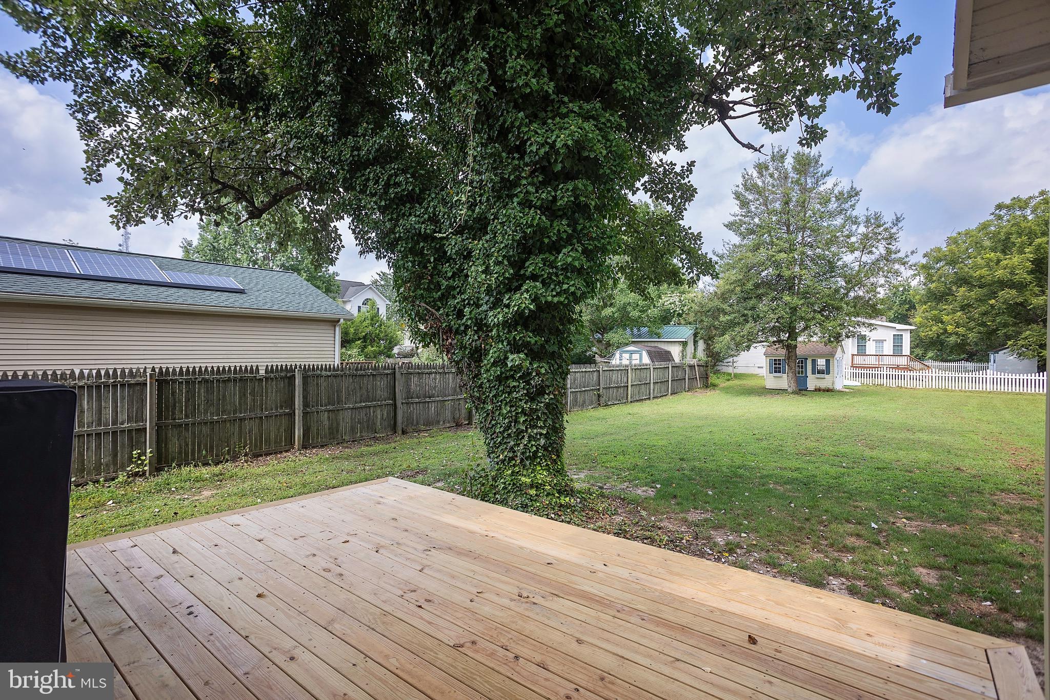 529 North 6th Street Denton, MD 21629 - Photo 21 of 21 a view of outdoor space with deck and garden