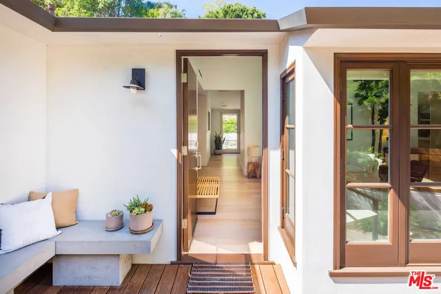a view of livingroom with furniture and wooden floor