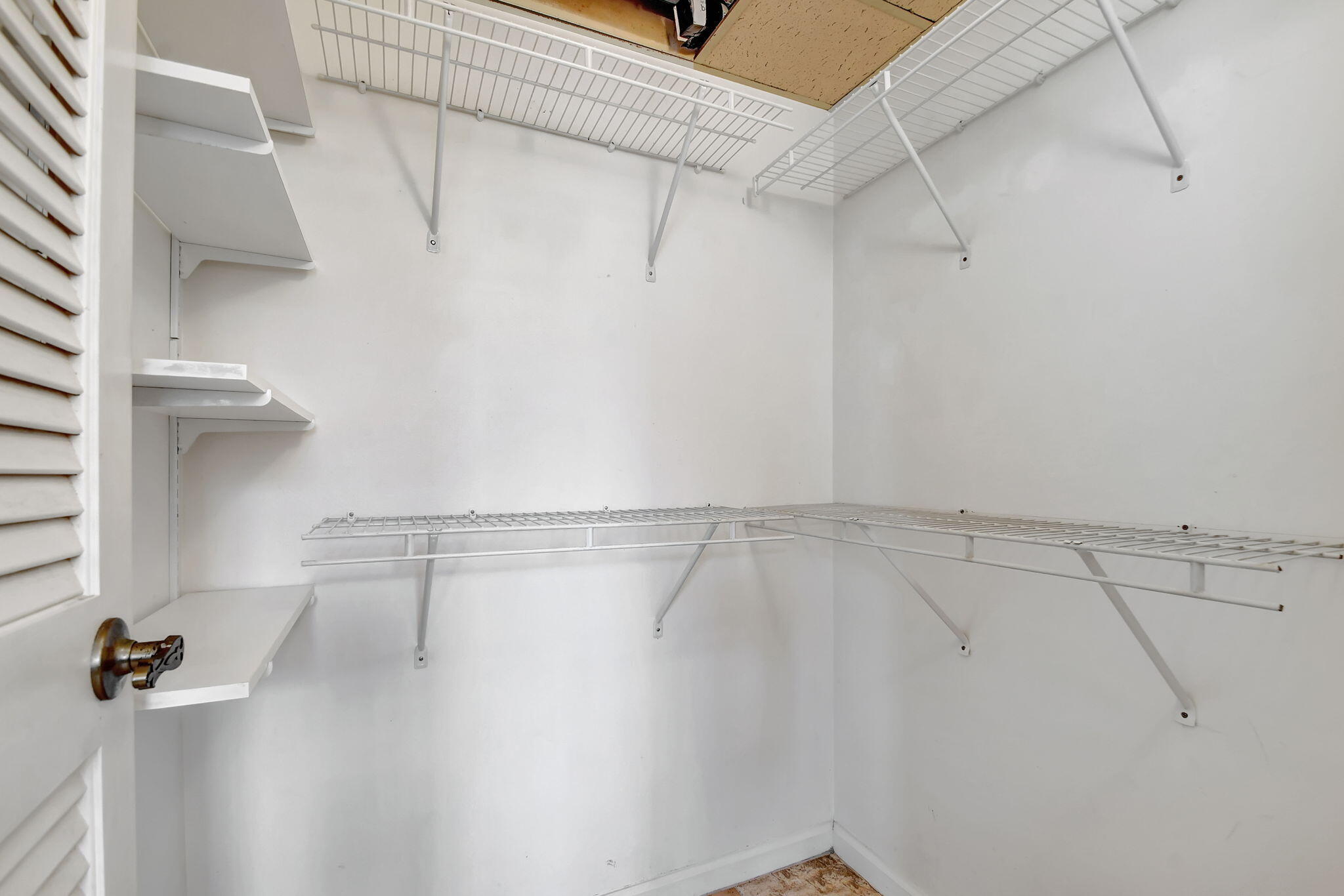 4489 Oak Terrace Drive Greenacres, FL 33463 - Photo 18 of 33 Primary bedroom walk in closet