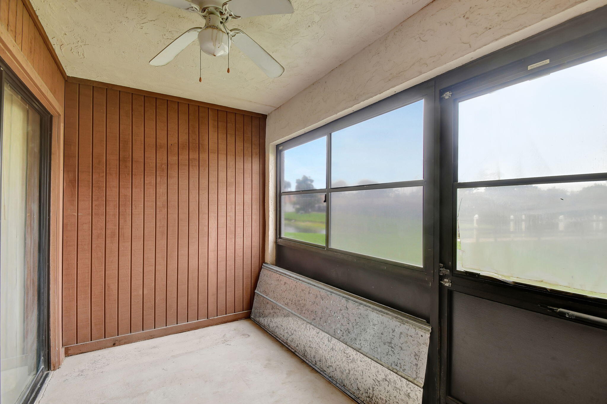 4489 Oak Terrace Drive Greenacres, FL 33463 - Photo 24 of 33 Patio overlooking lake