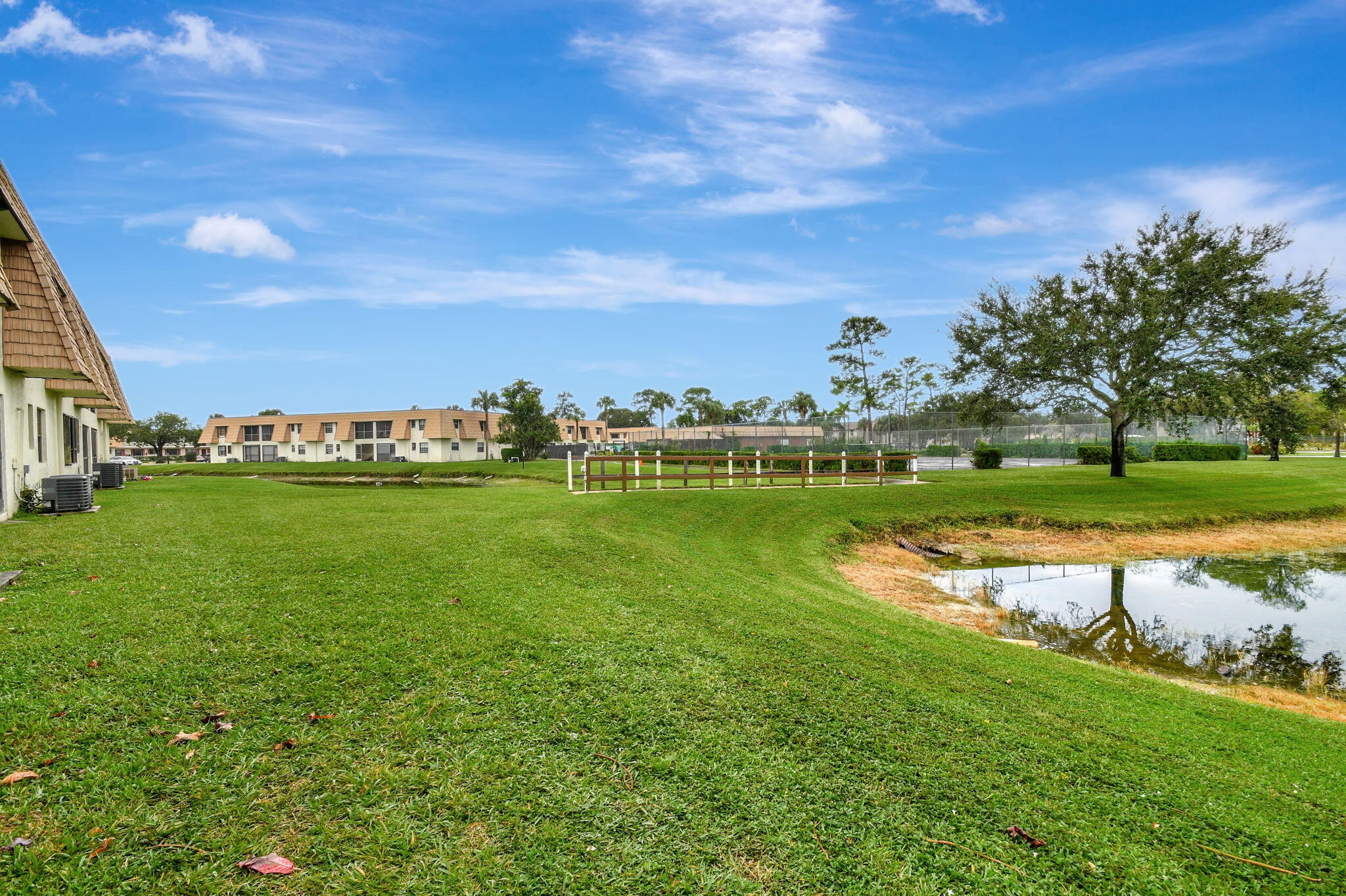 4489 Oak Terrace Drive Greenacres, FL 33463 - Photo 26 of 33 Walkway to pool