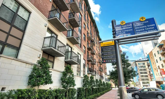 a street sign on a pole on a street