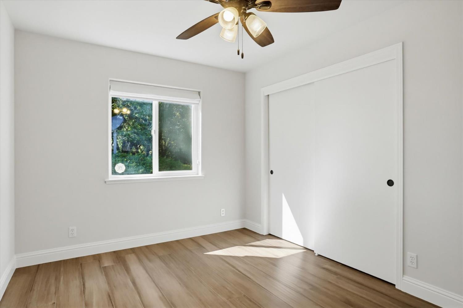 18639 Fay Ridge Court Grass Valley, CA 95949 - Photo 38 of 99 wooden floor in an empty room with a window