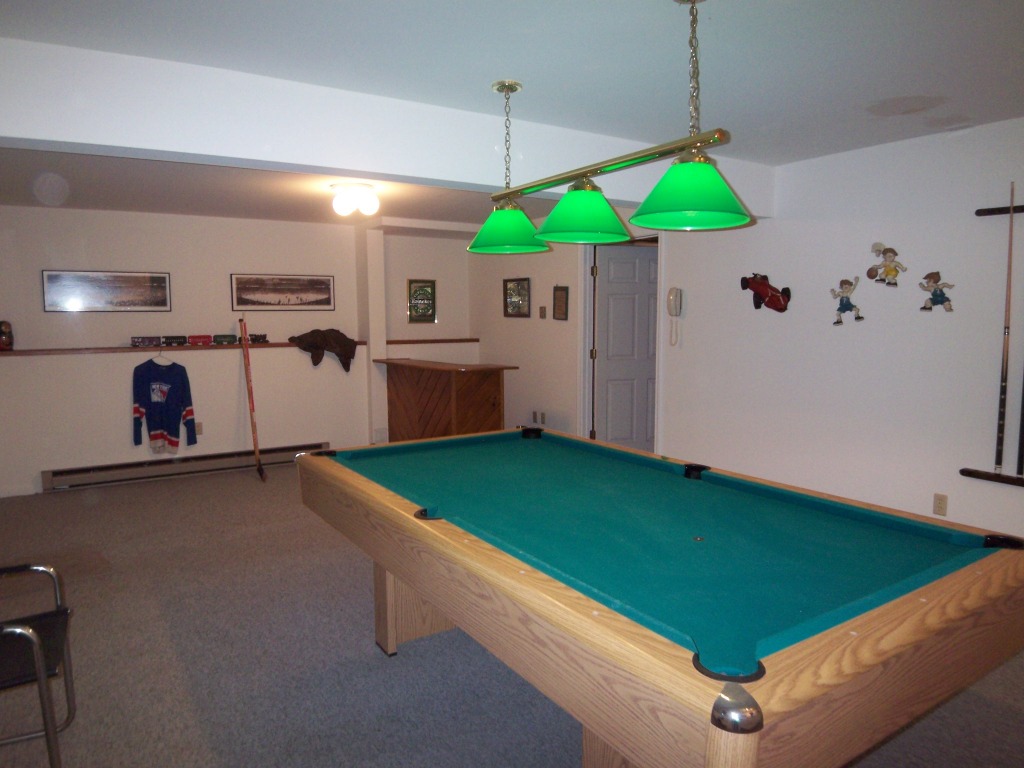 564 Leonhardt Road Becket, MA 01223 - Photo 6 of 11 a room with window and pool table