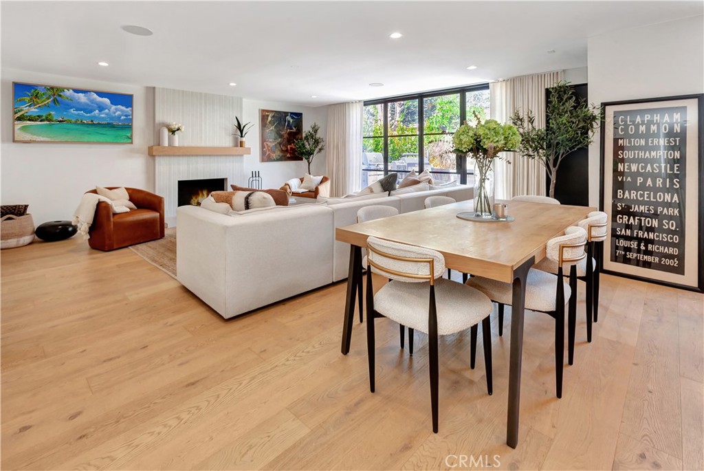 418 East 16th Street Costa Mesa, CA 92627 - Photo 8 of 28 a living room with furniture a large window and a table