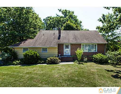 1 Timber Road Edison, NJ 08820 - Photo 2 of 22 a view of house with garden and yard