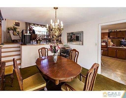 1 Timber Road Edison, NJ 08820 - Photo 11 of 22 a view of a dining room with furniture
