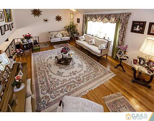 1 Timber Road Edison, NJ 08820 - Photo 13 of 22 a living room with furniture and a couch