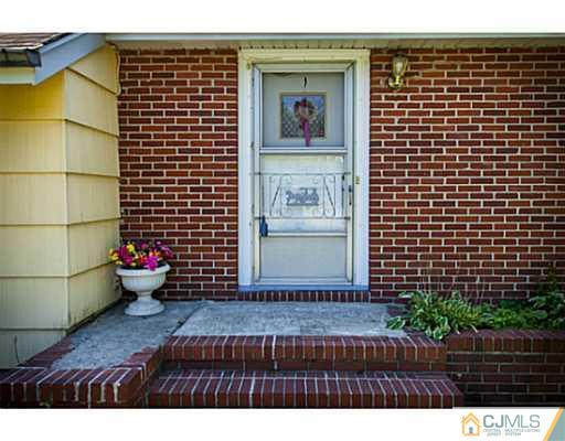 1 Timber Road Edison, NJ 08820 - Photo 3 of 22 a view of a backyard with a garden