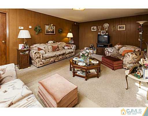 1 Timber Road Edison, NJ 08820 - Photo 5 of 22 a living room with furniture and wooden floor