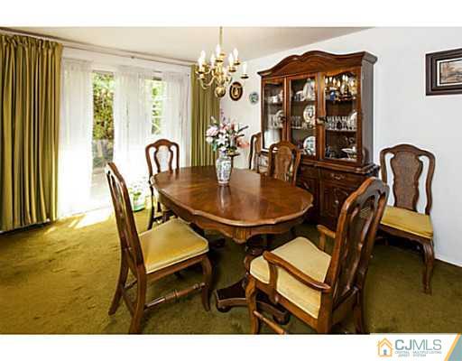 1 Timber Road Edison, NJ 08820 - Photo 10 of 22 a dining room with furniture and window