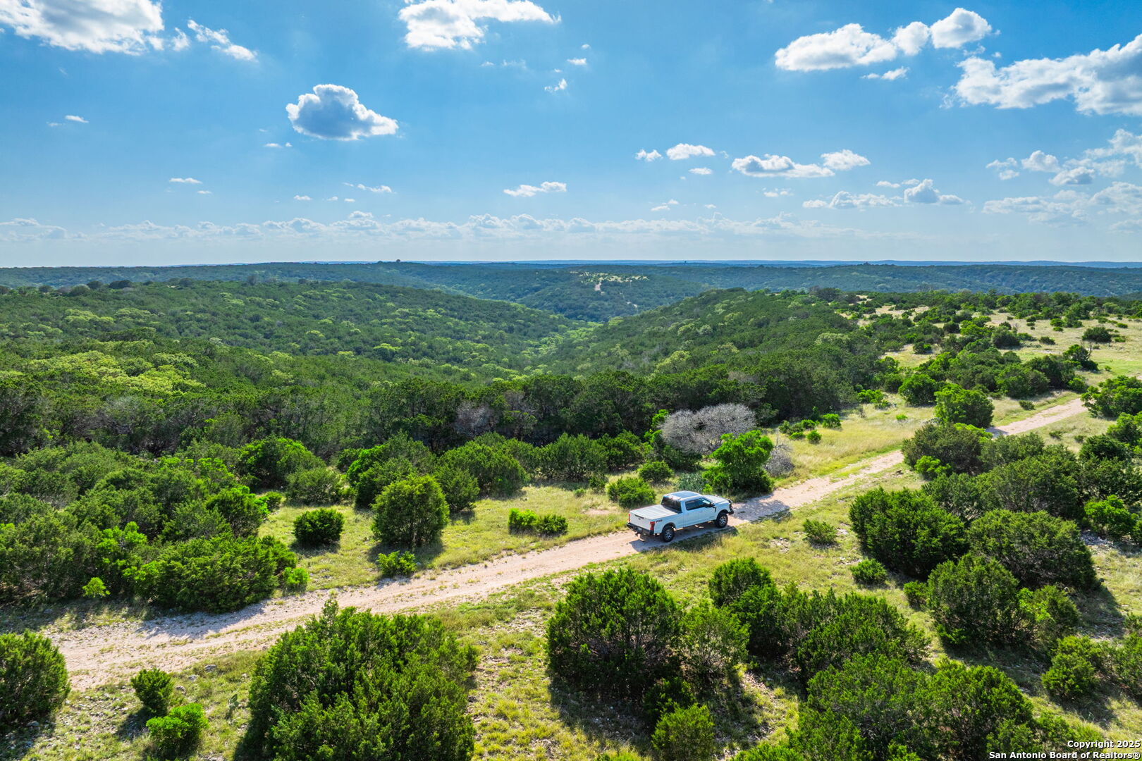 0 Fair Ranch Road Barksdale, TX 78828 - Photo 12 of 45 a view of a lake with a city
