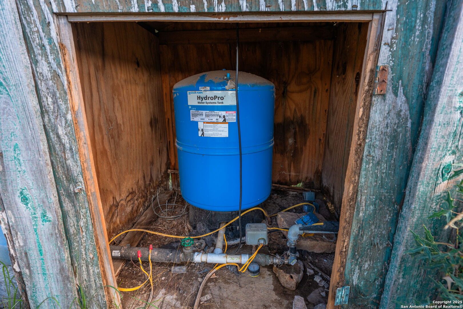 0 Fair Ranch Road Barksdale, TX 78828 - Photo 37 of 45 a room with water heater and wooden door