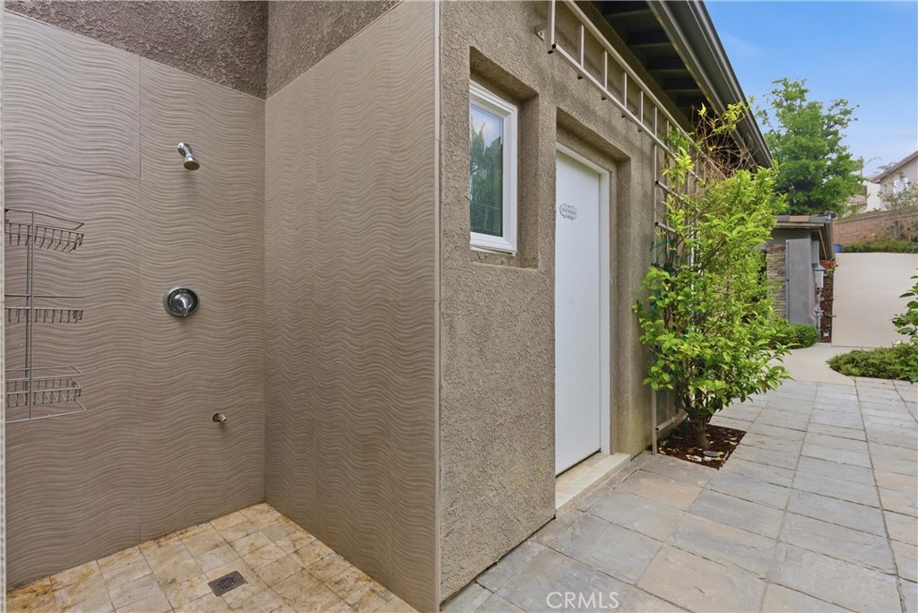 29131 Bouquet Canyon Road Silverado, CA 92676 - Photo 34 of 74 Outdoor shower and pool bathroom access from backyard