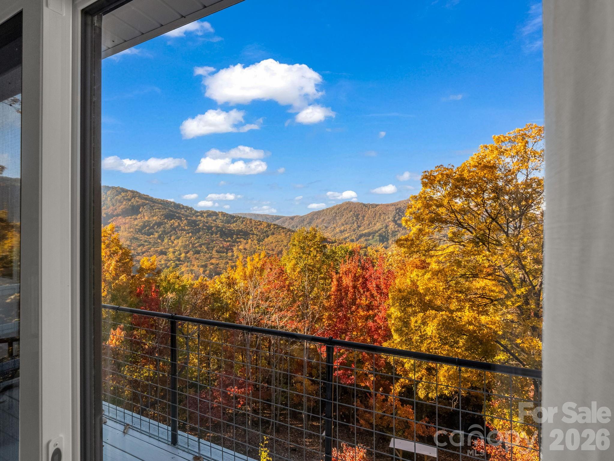 200 Piney Mountain Road Tryon, NC 28782 - Photo 3 of 48 a view of a city from a balcony
