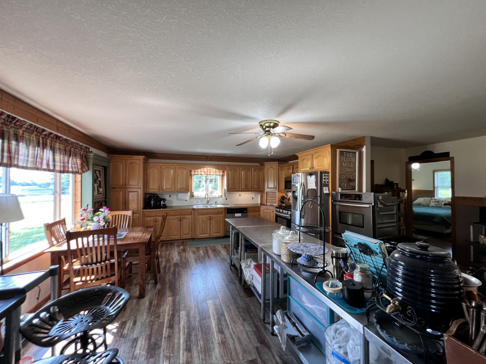 4250 Standing Rock Road Jamestown, TN 38556 - Photo 12 of 70 a living room with lots of furniture and a flat screen tv