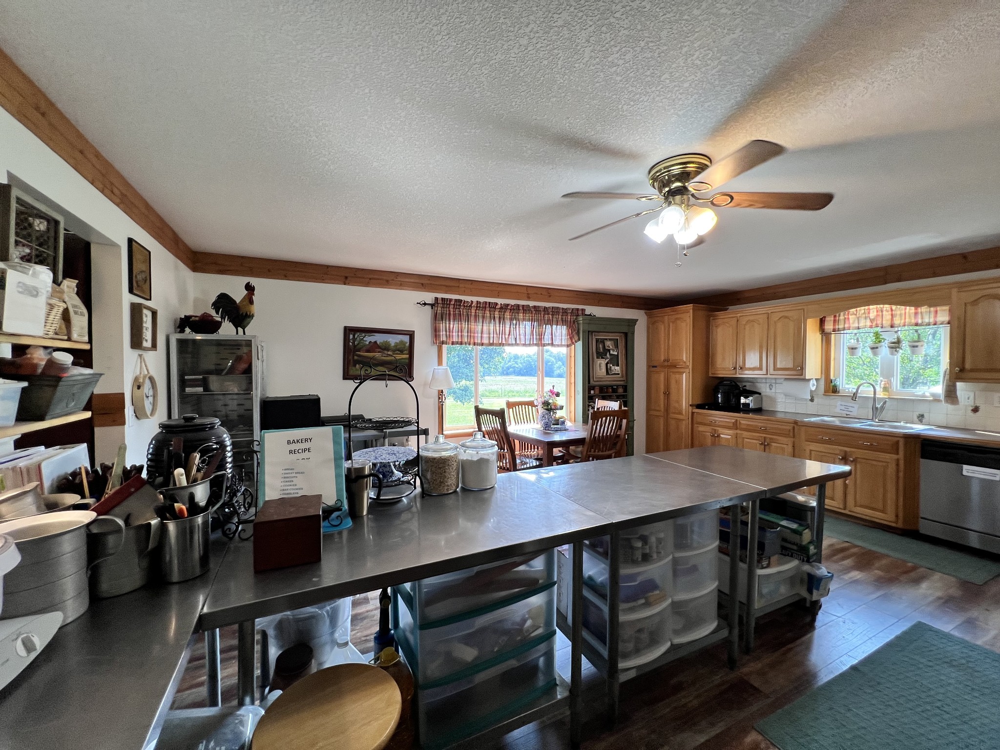 4250 Standing Rock Road Jamestown, TN 38556 - Photo 14 of 70 a view of a dining room with furniture window and wooden floor