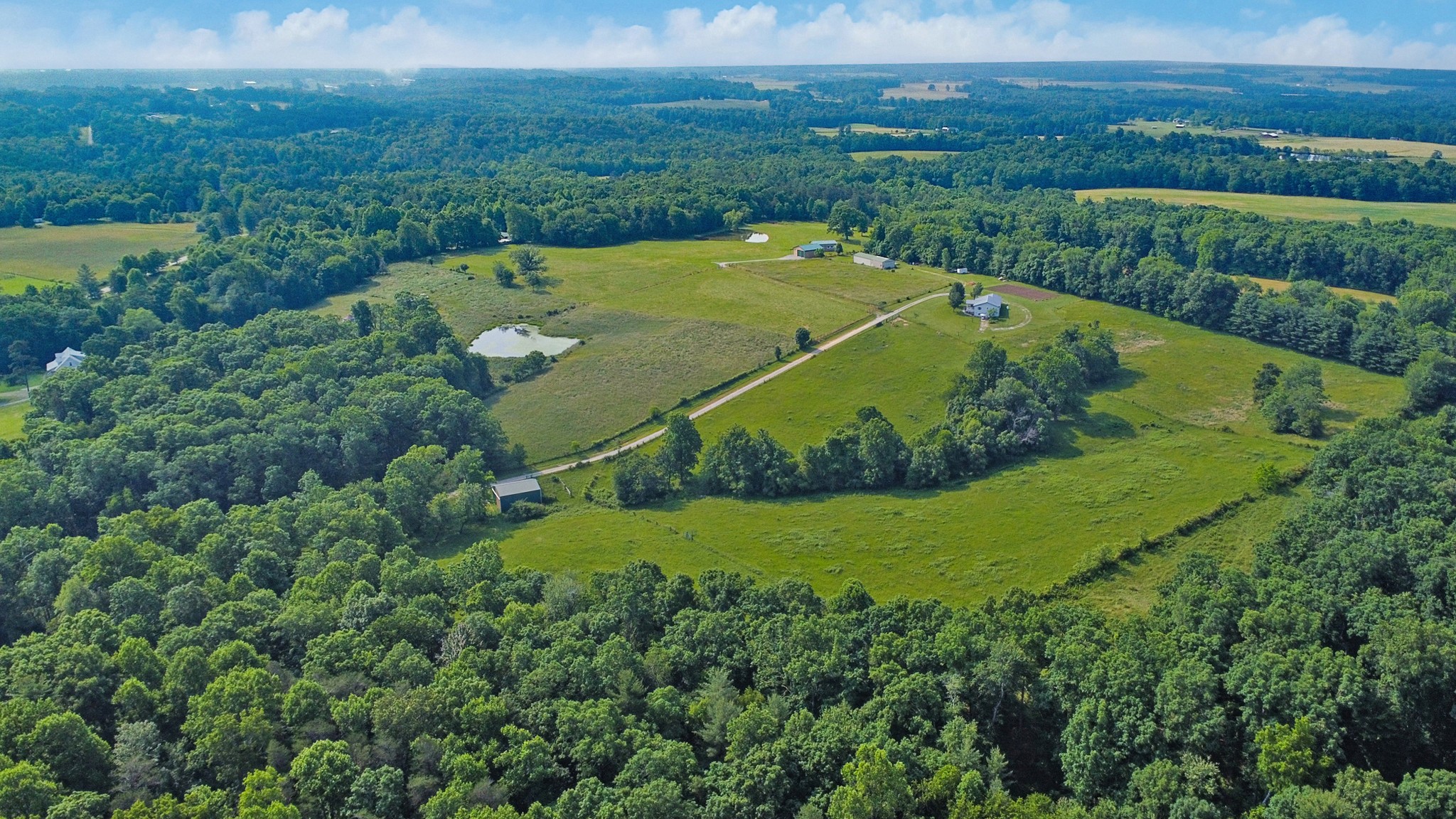 4250 Standing Rock Road Jamestown, TN 38556 - Photo 17 of 70 an aerial view of a house