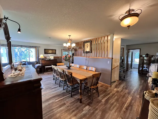 a room with furniture and wooden floor