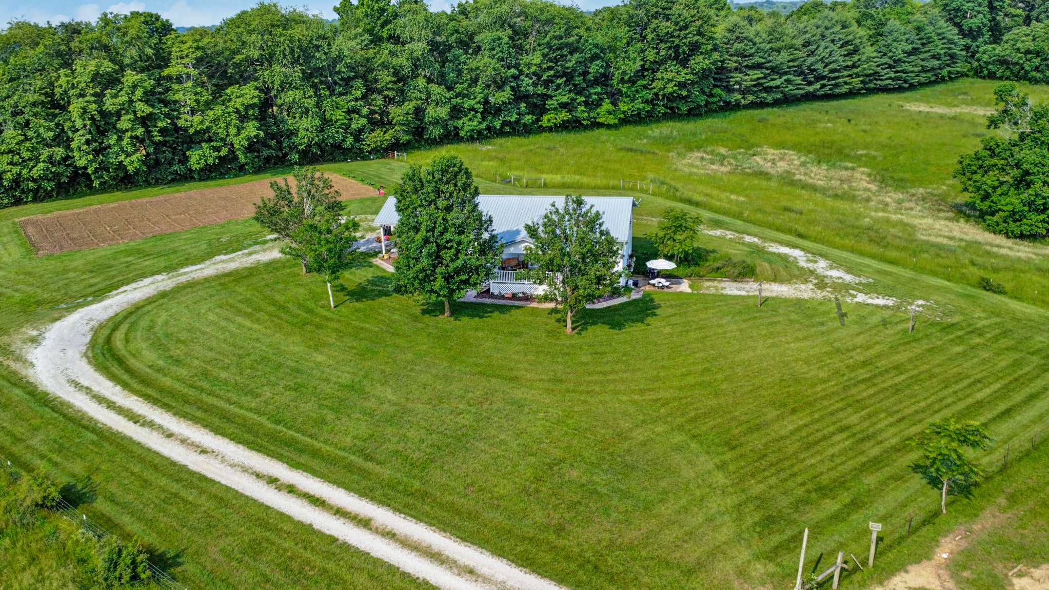 4250 Standing Rock Road Jamestown, TN 38556 - Photo 23 of 70 a view of a golf course with a lake
