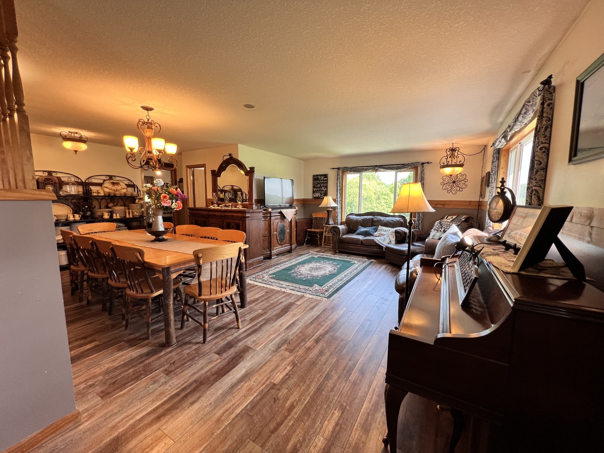 4250 Standing Rock Road Jamestown, TN 38556 - Photo 32 of 70 a living room with furniture and wooden floor