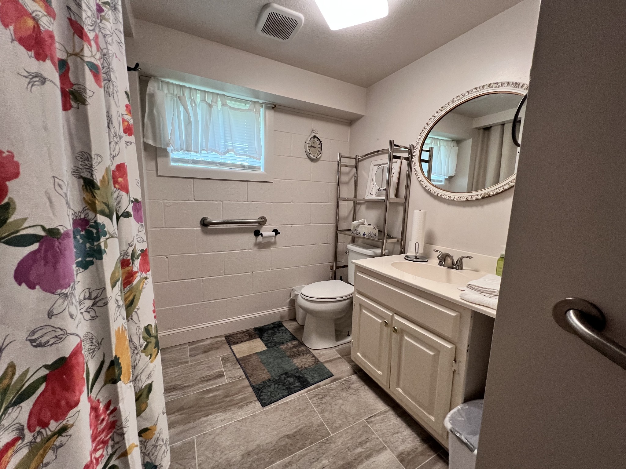 4250 Standing Rock Road Jamestown, TN 38556 - Photo 33 of 70 a bathroom with a sink toilet and shower