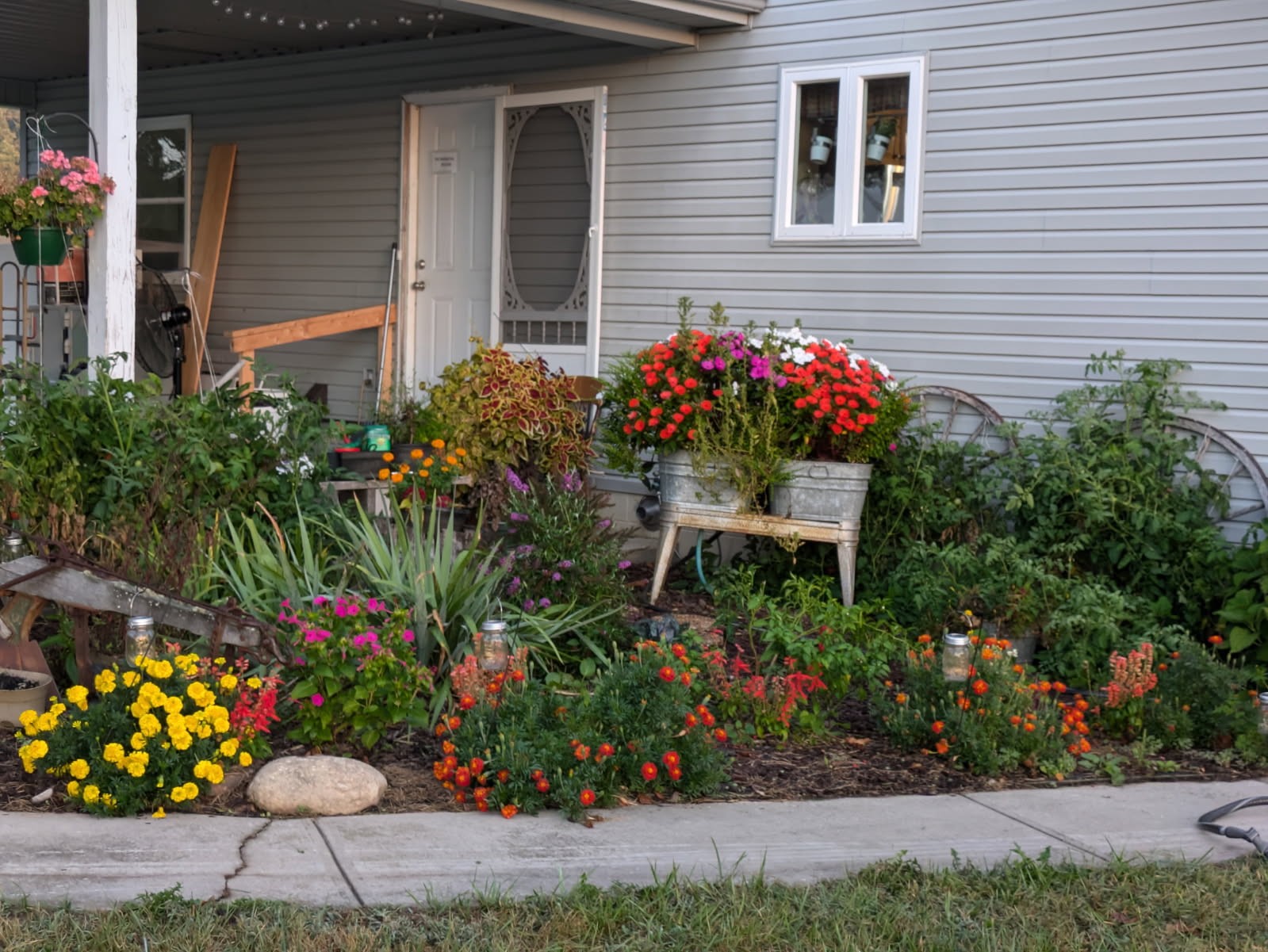 4250 Standing Rock Road Jamestown, TN 38556 - Photo 61 of 70 a bunch of flowers are in front of house