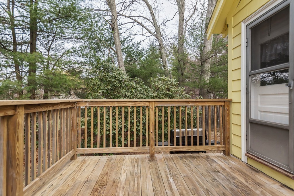 338 Andover Road Billerica, MA 01821 - Photo 16 of 16 a view of a wooden street from a balcony