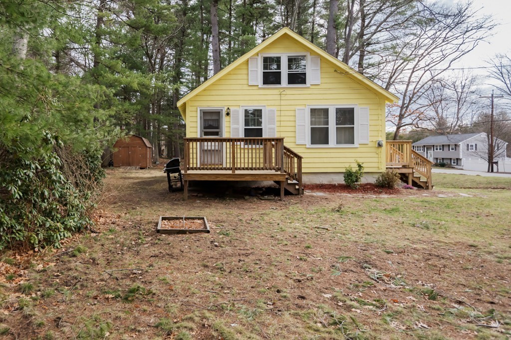 338 Andover Road Billerica, MA 01821 - Photo 2 of 16 a view of a house with a yard