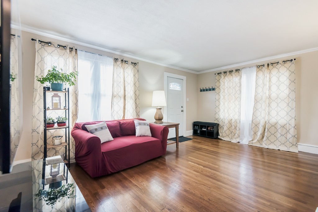 338 Andover Road Billerica, MA 01821 - Photo 5 of 16 a living room with furniture and a large window