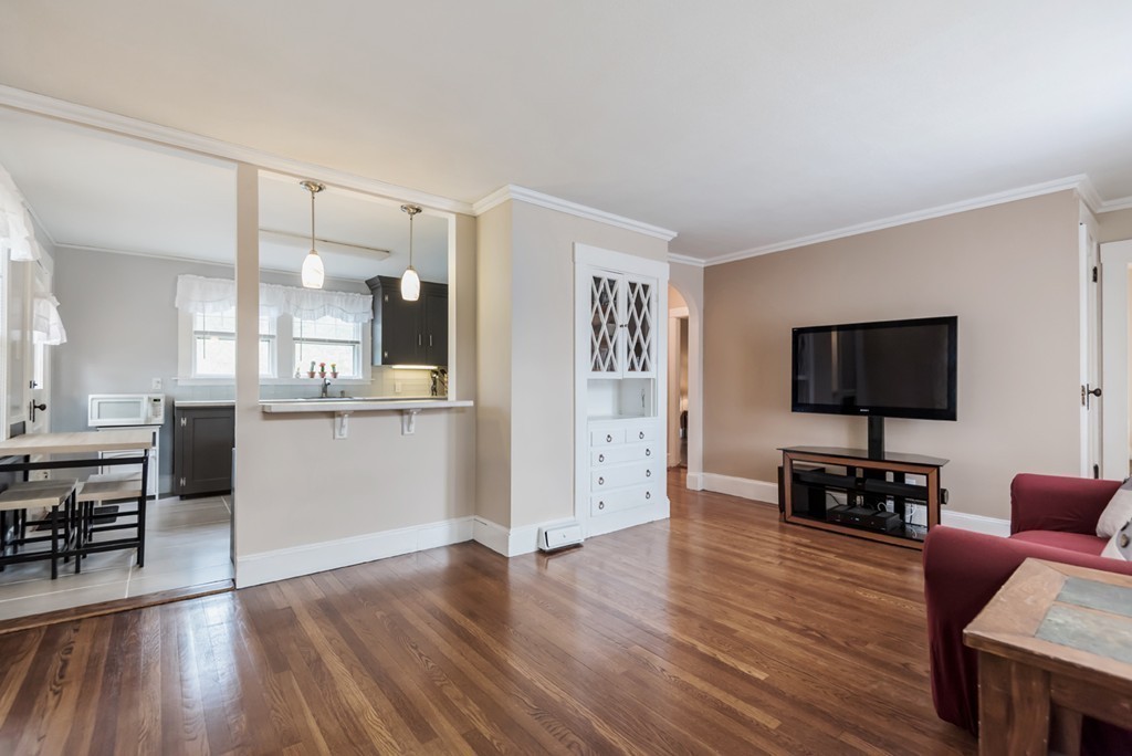 338 Andover Road Billerica, MA 01821 - Photo 7 of 16 a living room with furniture and a wooden floor