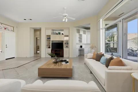 a kitchen with a stove sink and cabinets