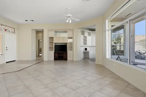 a view of a dining room with furniture window and outside view
