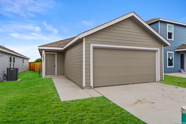 a front view of house with yard