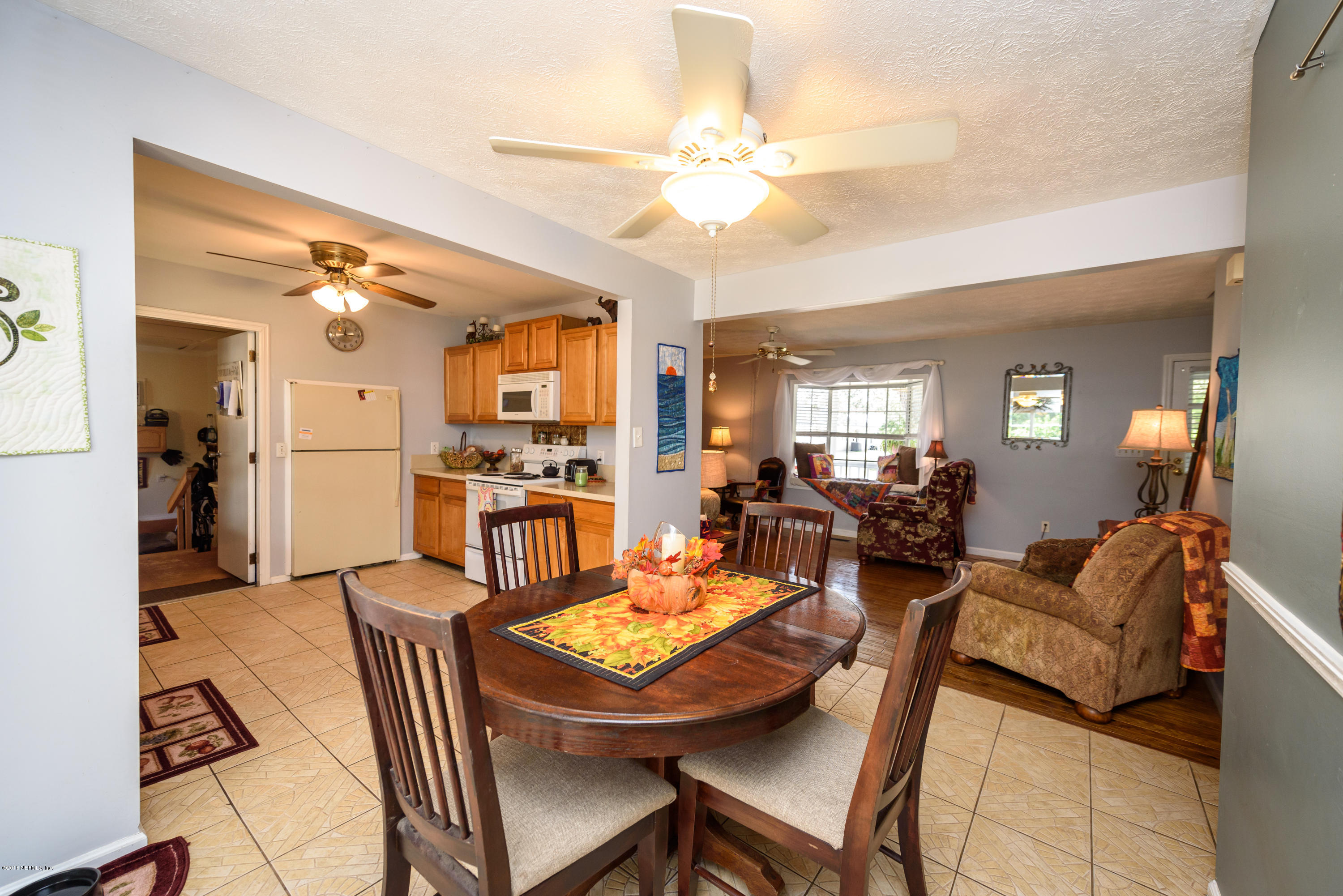 249 Bonita Road St. Augustine, FL 32086 - Photo 17 of 46 a view of a dining room with furniture