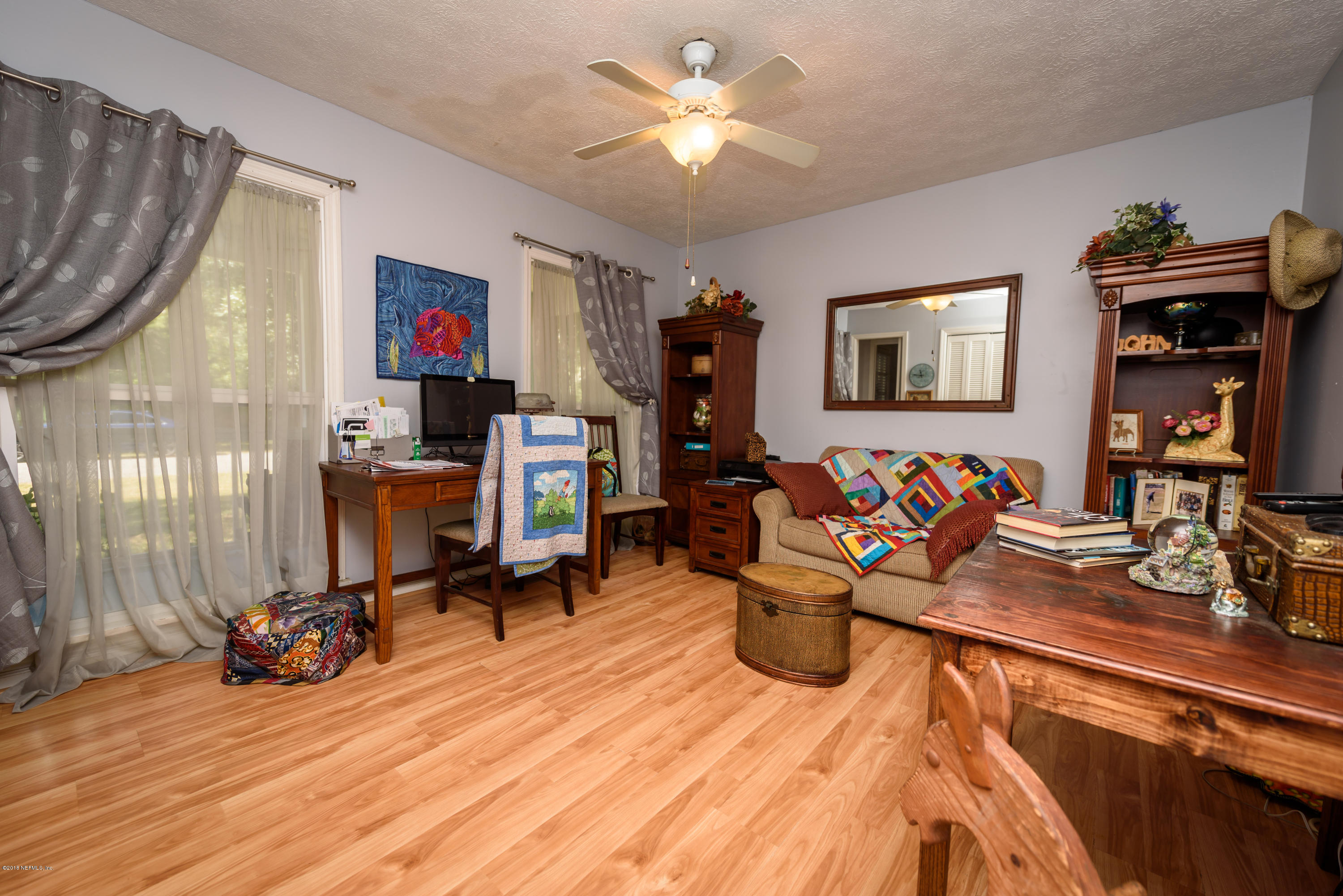 249 Bonita Road St. Augustine, FL 32086 - Photo 24 of 46 a view of a room with gym equipment