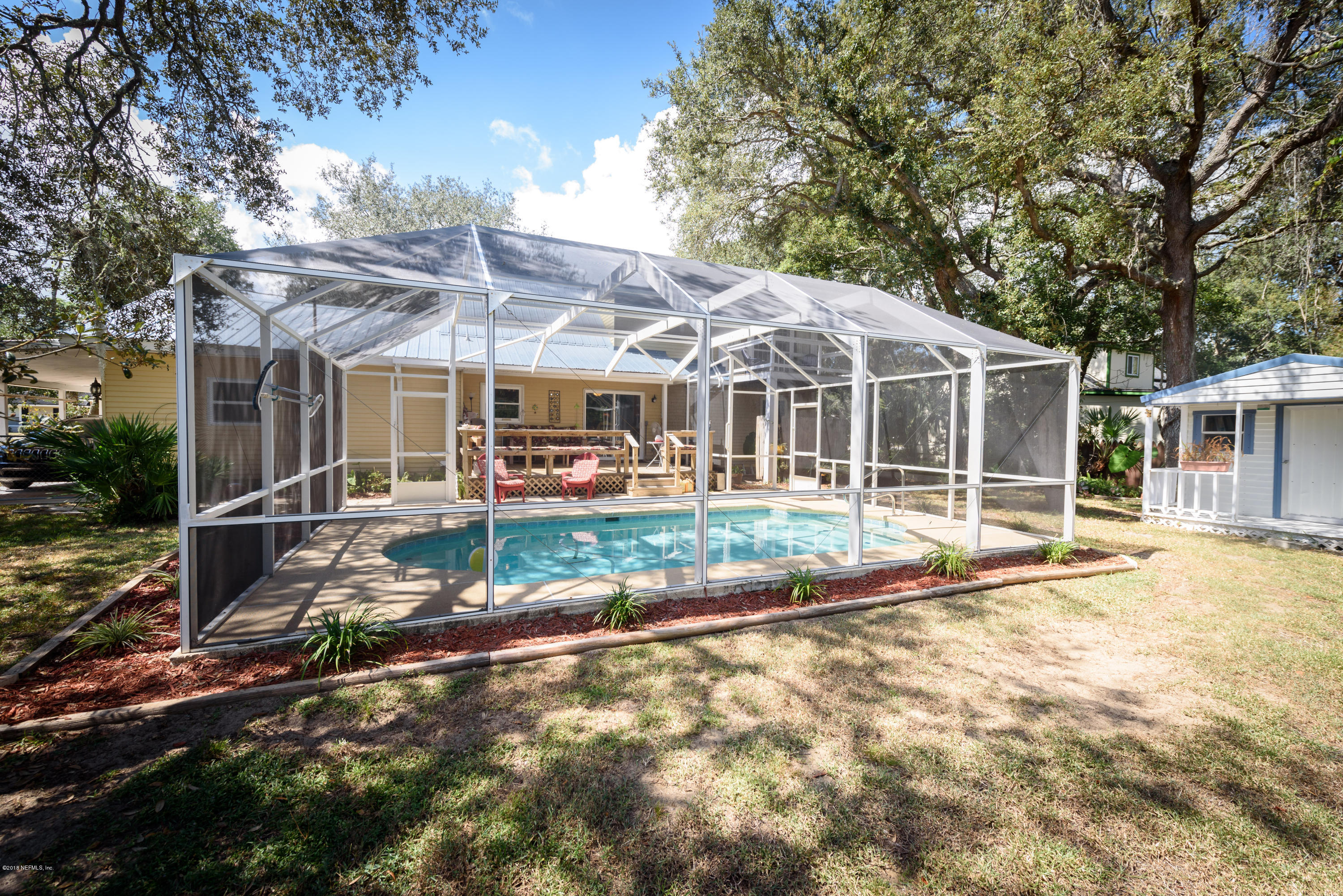 249 Bonita Road St. Augustine, FL 32086 - Photo 40 of 46 an outdoor view of house with yard