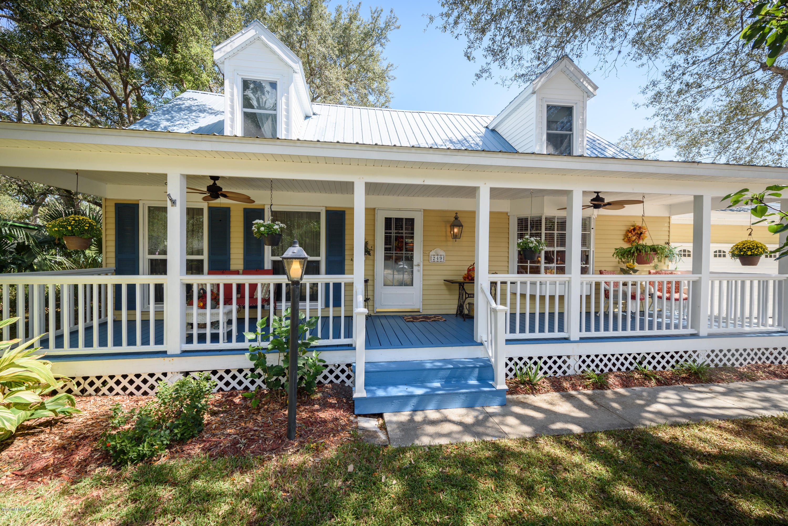 249 Bonita Road St. Augustine, FL 32086 - Photo 6 of 46 front view of a house with a porch