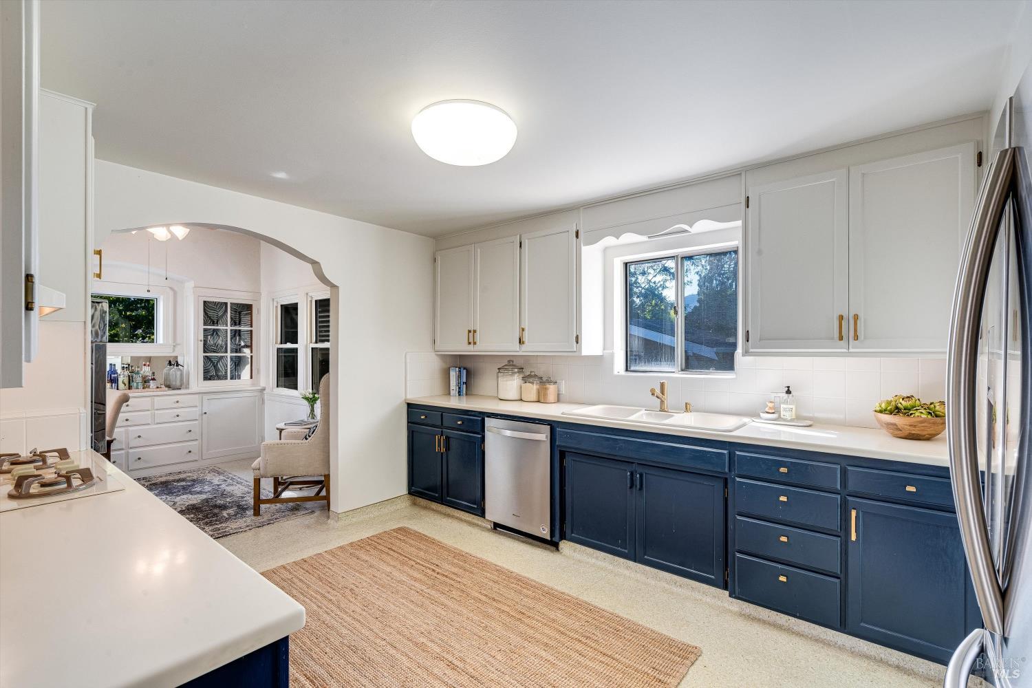 1709 Spring Mountain Road St. Helena, CA 94574 - Photo 16 of 48 a spacious bathroom with double vanity and a mirror