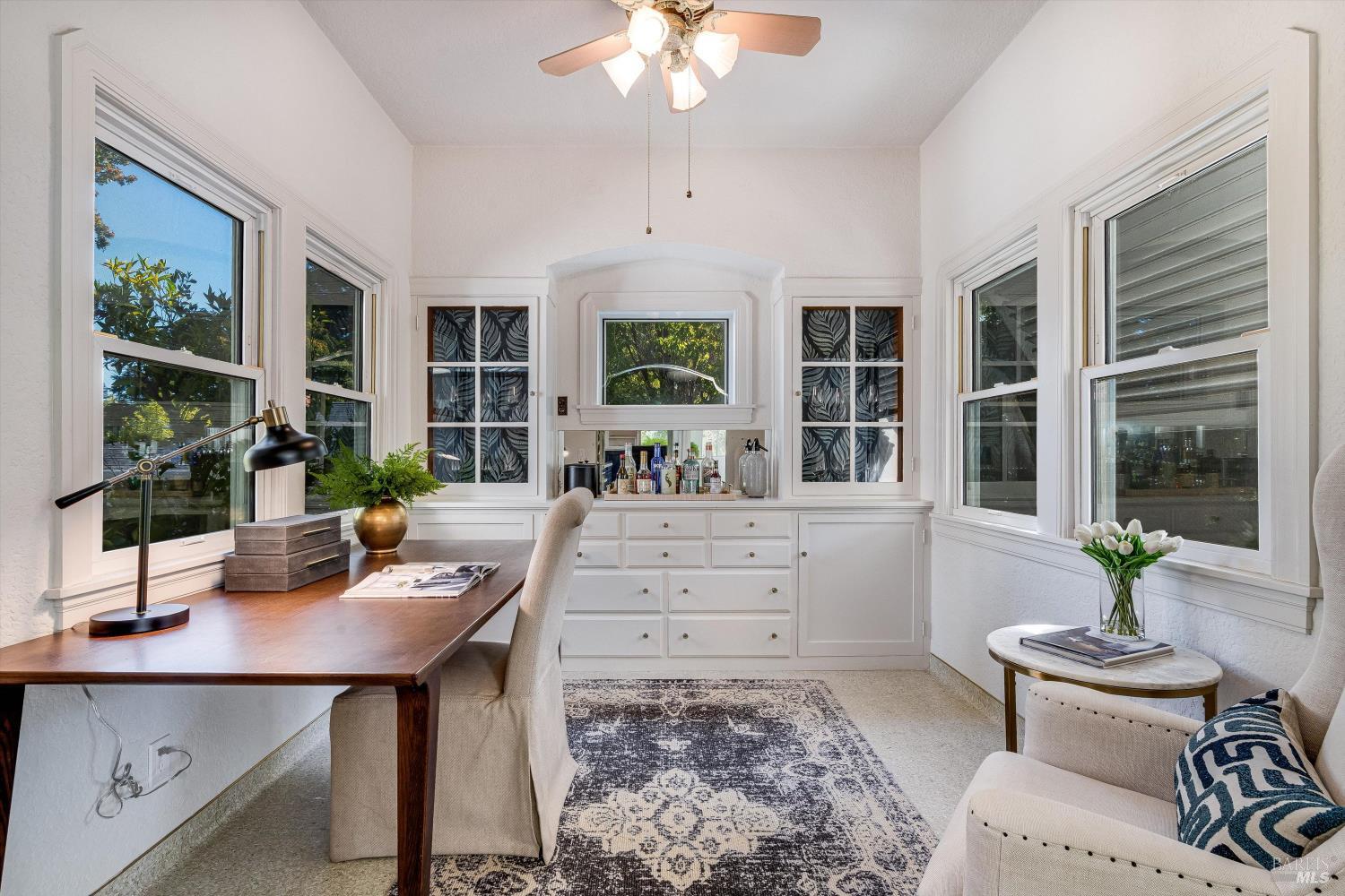 1709 Spring Mountain Road St. Helena, CA 94574 - Photo 20 of 48 a workspace with furniture window and wooden floor