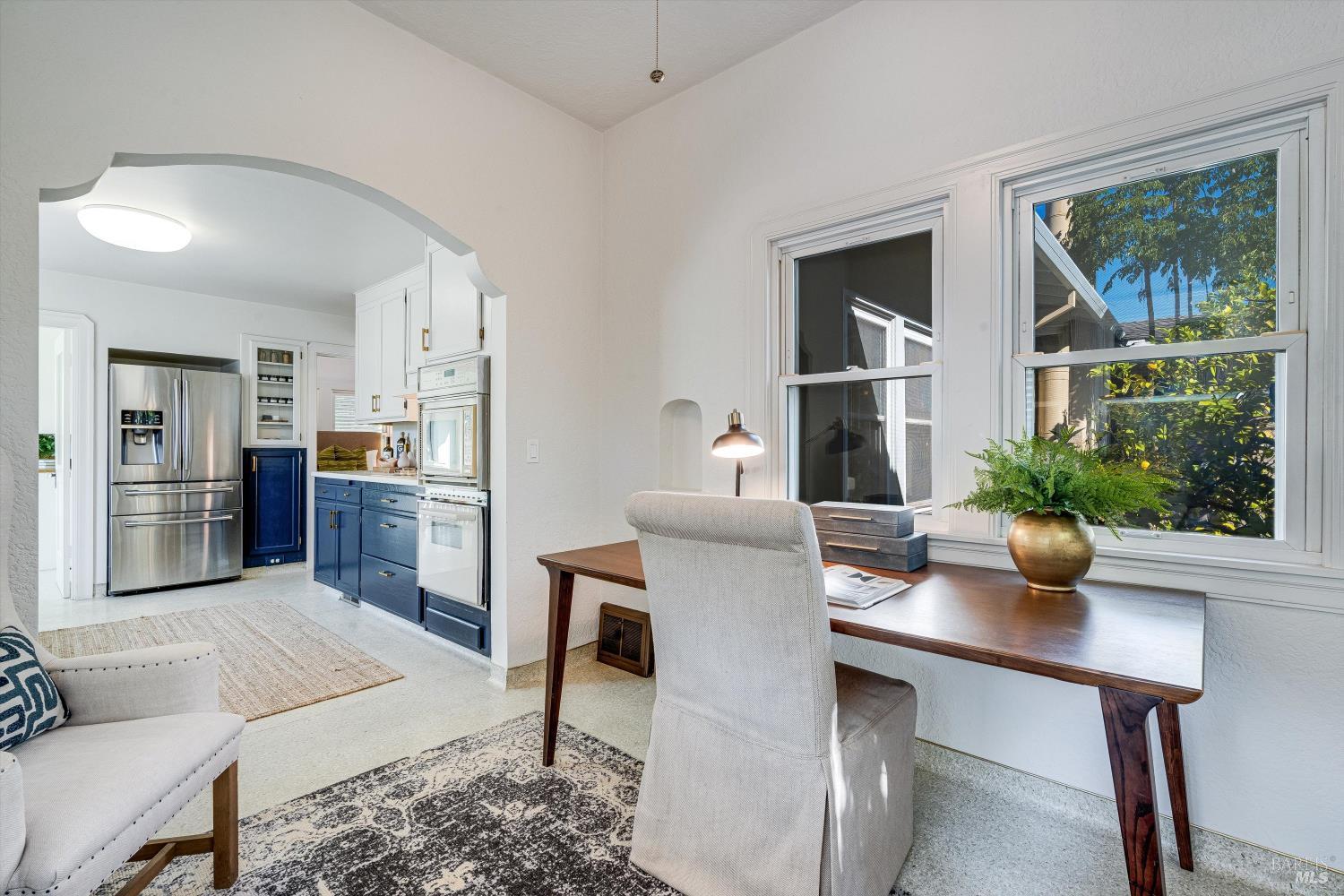 1709 Spring Mountain Road St. Helena, CA 94574 - Photo 21 of 48 a living room with furniture and large windows