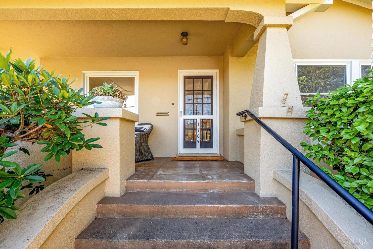 1709 Spring Mountain Road St. Helena, CA 94574 - Photo 3 of 48 a front view of a house with a yard