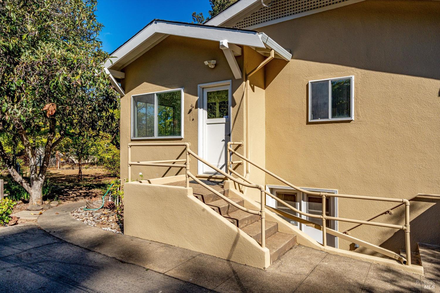 1709 Spring Mountain Road St. Helena, CA 94574 - Photo 31 of 48 a front view of a house with parking