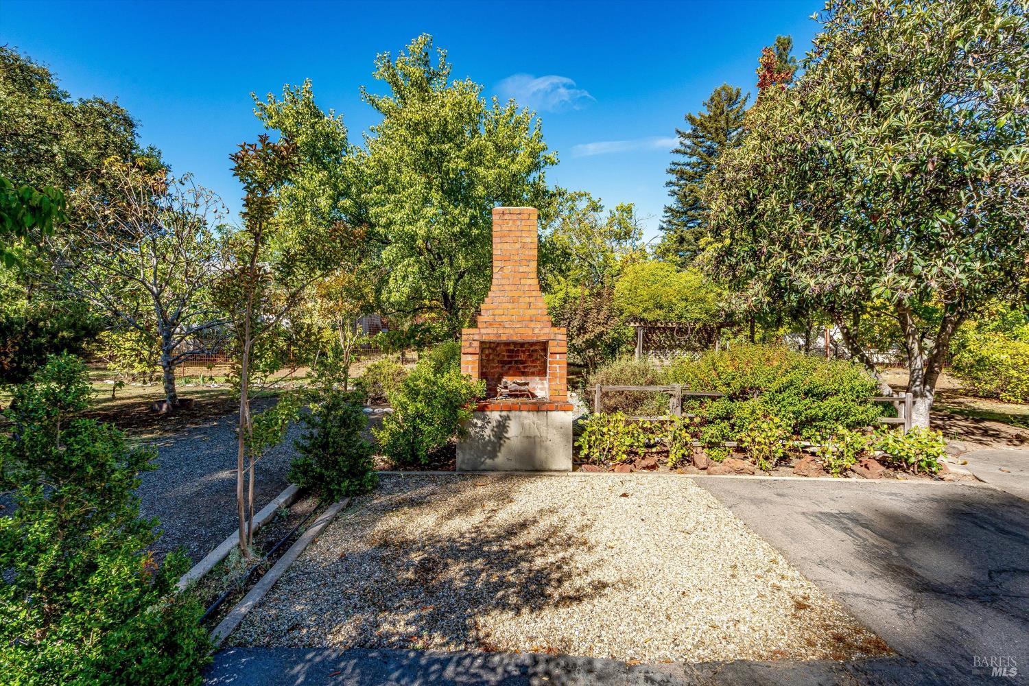 1709 Spring Mountain Road St. Helena, CA 94574 - Photo 39 of 48 a front view of a house with a yard