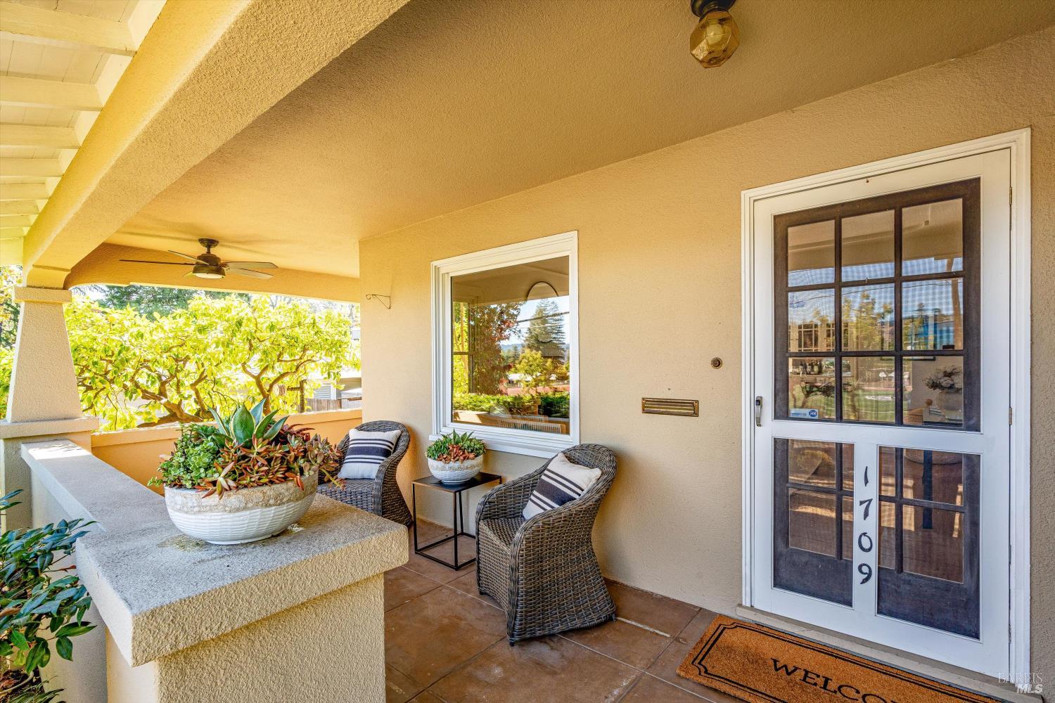 1709 Spring Mountain Road St. Helena, CA 94574 - Photo 4 of 48 a living room with furniture and a window