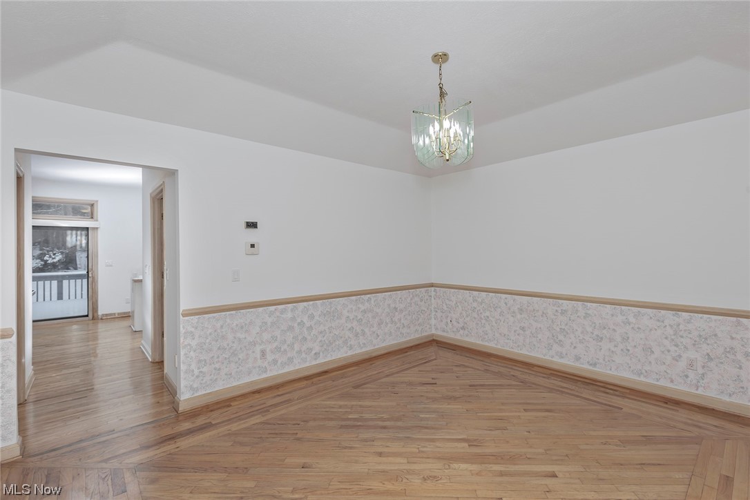 3850 Ellendale Road Moreland Hills, OH 44022 - Photo 6 of 39 Dining Room features hardwood floors and chair rail
