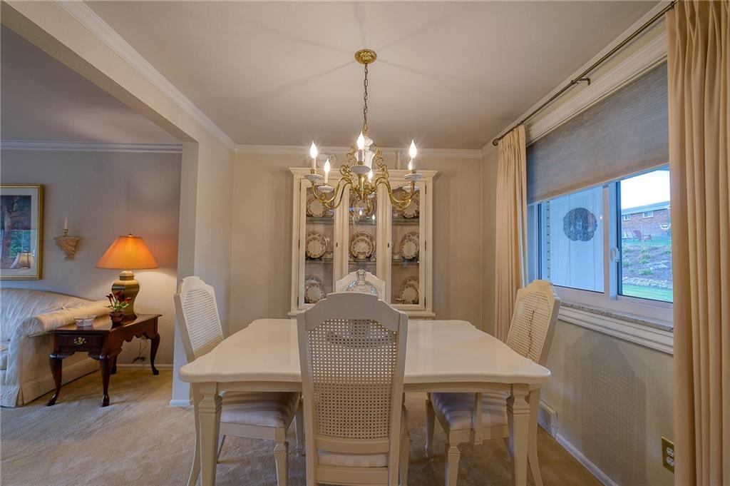 120 Louis Drive McKees Rocks, PA 15136 - Photo 14 of 25 a view of a dining room with furniture and chandelier
